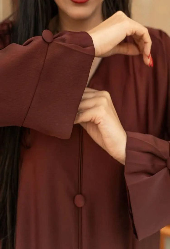 Ramadan kareem 2025 Effortless elegance: A flowing brown gown with button detailing - DONGMEI CHEN TEXTILES