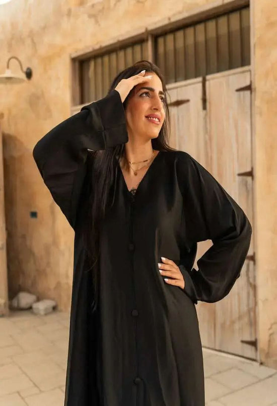 Ramadan kareem 2025 Effortless Grace: Flowing Black Abaya with Button Accents - DONGMEI CHEN TEXTILES